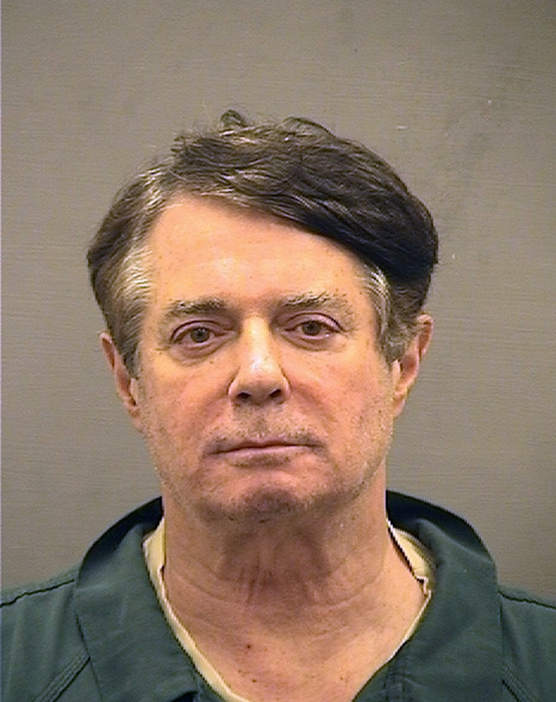 Paul Manafort poses for a mugshot photo at the Alexandria Detention Center in Alexandria, Virgina. Manafort has been charged with money laundering and bank fraud, among other violations.